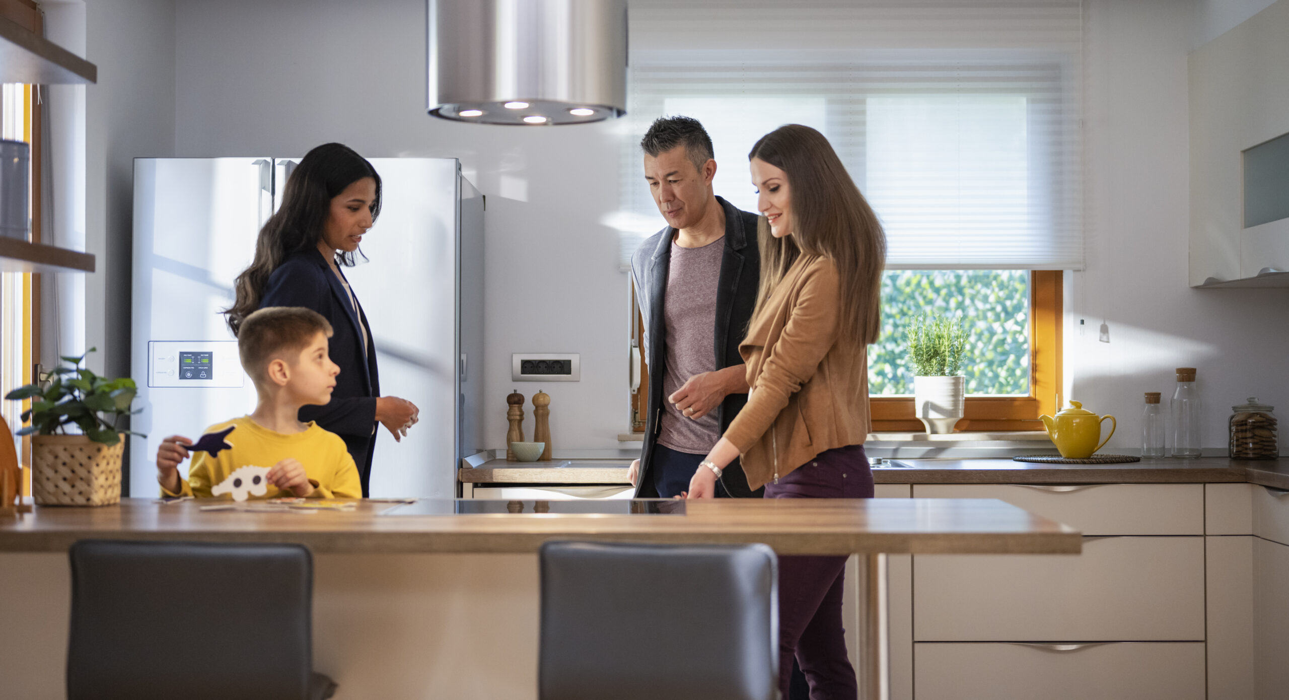 Real Estate Agent Showing House To Family